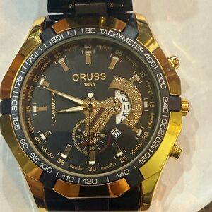 #68 Gold and Black ORUSS Watch with elegant style.